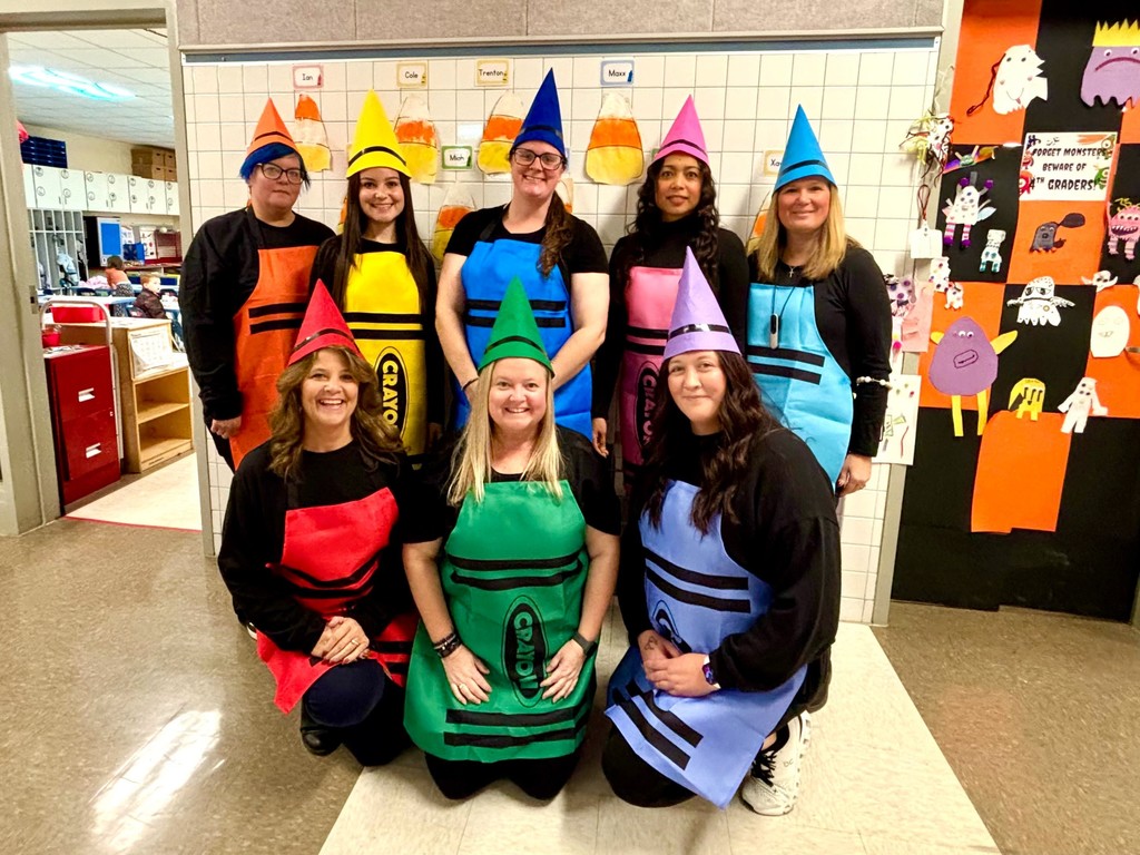PreK Teachers dressed as crayons