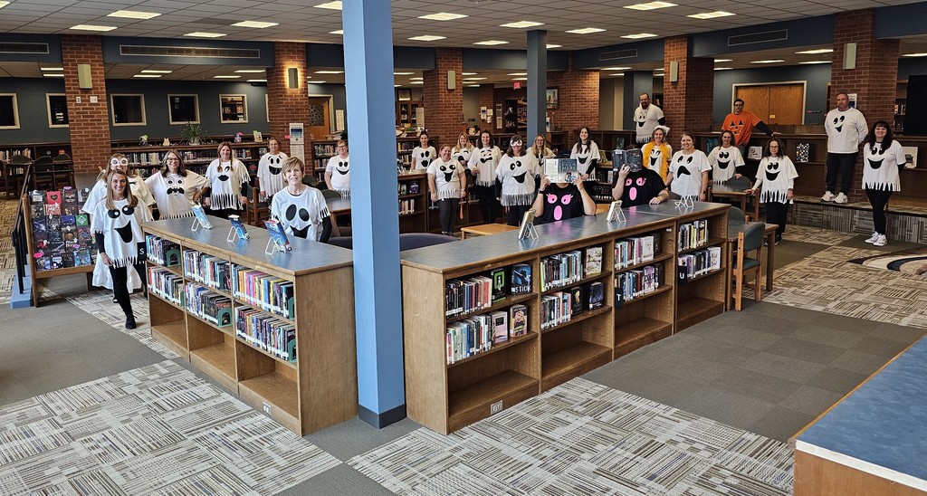 faculty library pic all dressed as ghosts