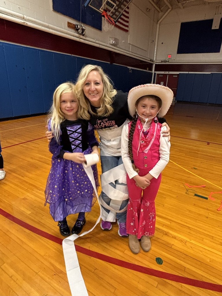 Teacher and two students dressed up for halloween