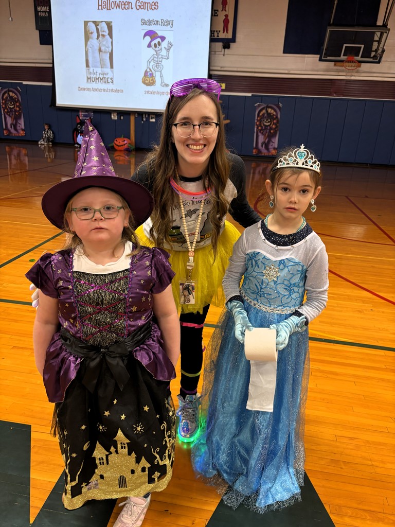 Teahcer and two kindergaren students posing for picture dressed up for halloween