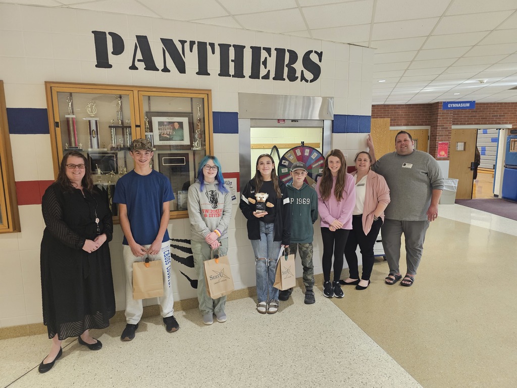 Group photo of students and ServU workers at the teller location in Campbell
