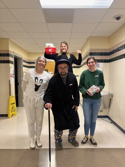 Teachers dressed up as the scrooge and characters