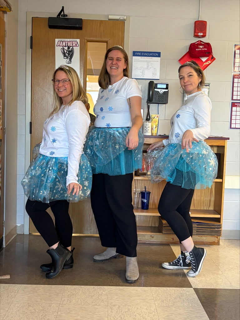 3 teachers dressed as snowflakes with balerina skirts