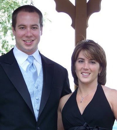 Formal phot of girl and boy in black dress and tux