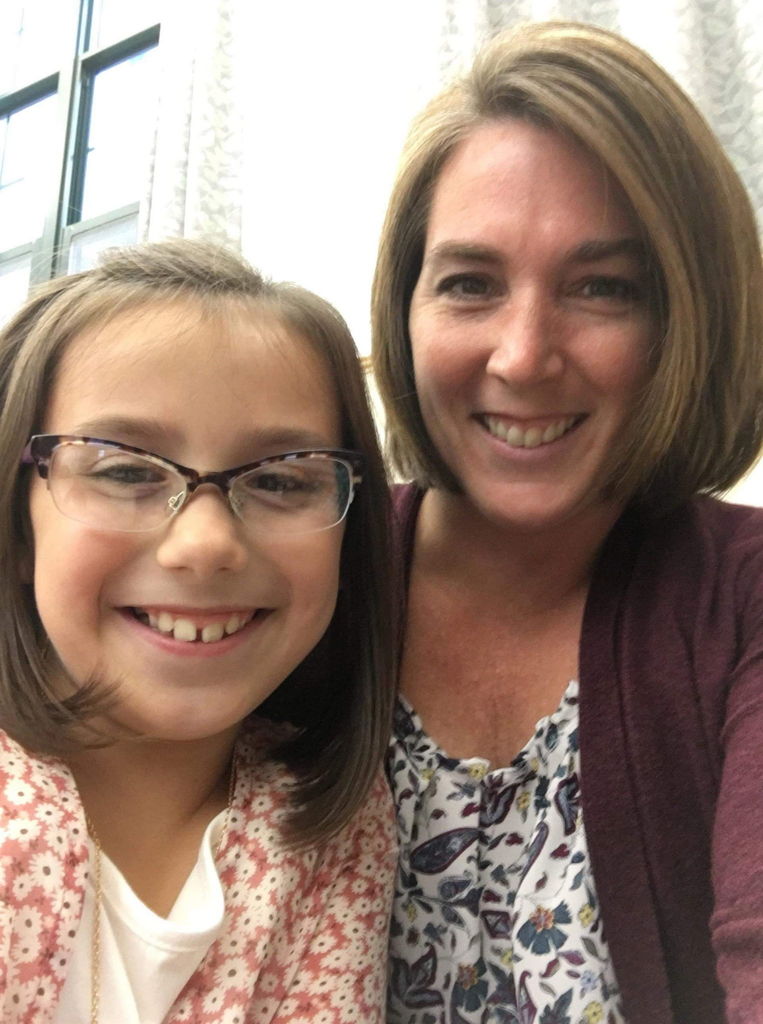 Smiling close up picture with mother and daughter