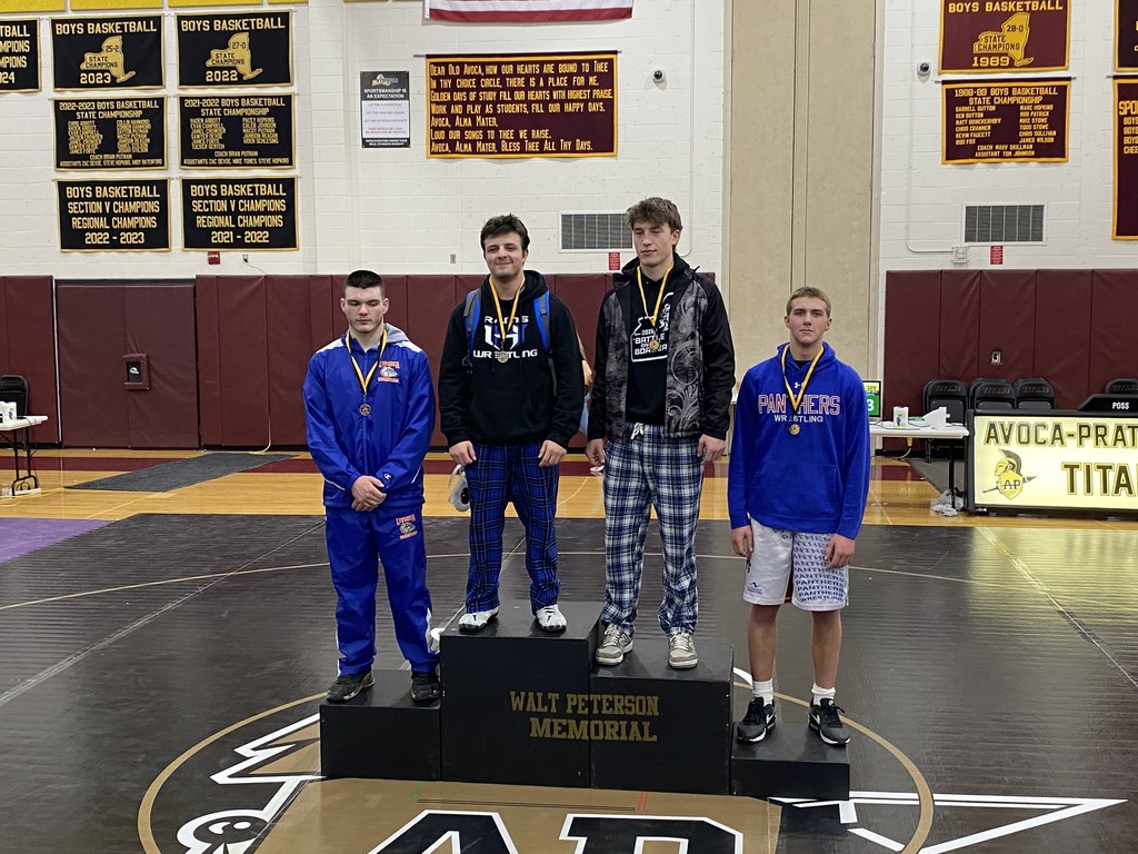 Wrestling pic of winners on podium