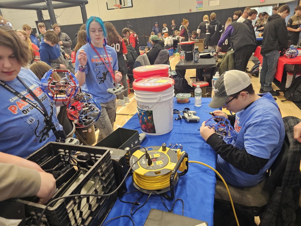 Students working on thier drones between matches