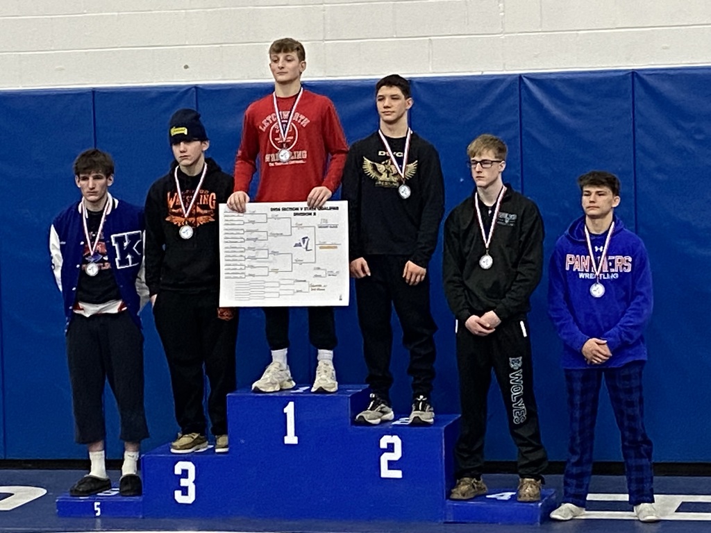 Podium picture of top 6 at wrestling tournament