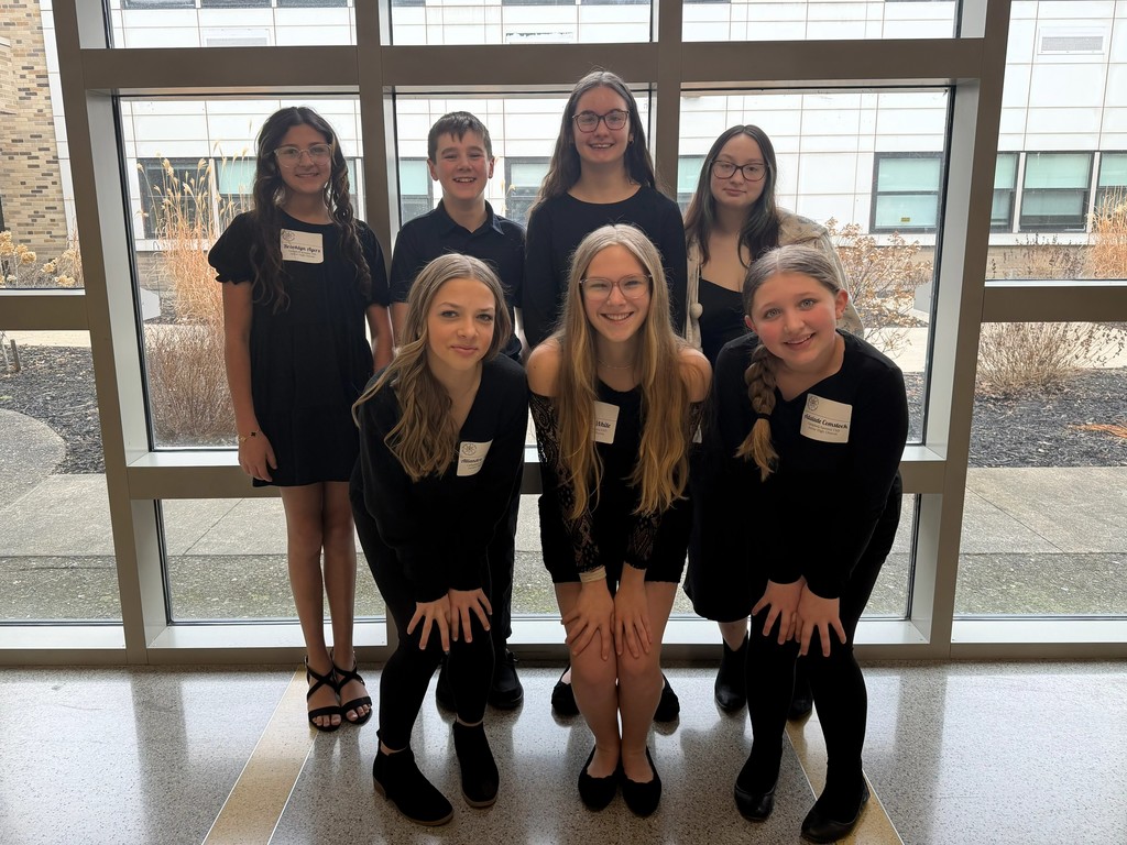 JR High Chorus all county students dressed in black posing for picture