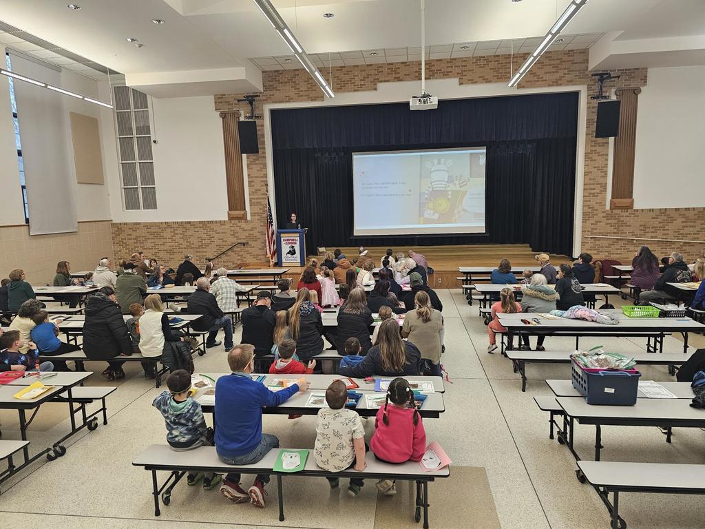 Crowd picture in the cafeteria during read aloud by assistant principal
