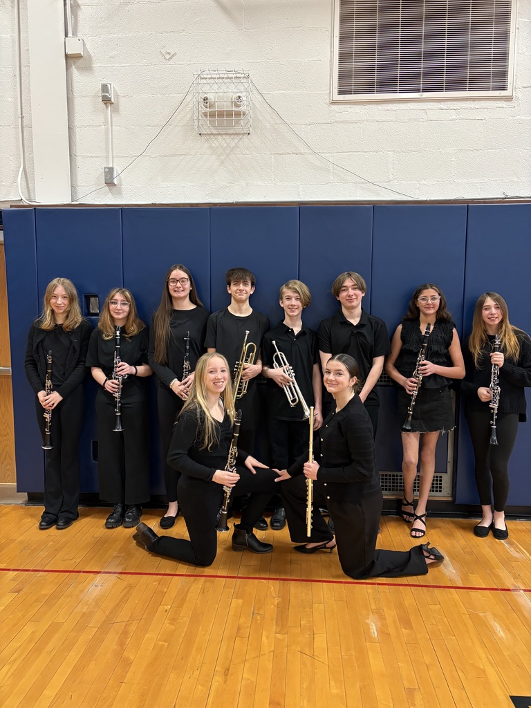 Jr High Band dressed in black posing in picture