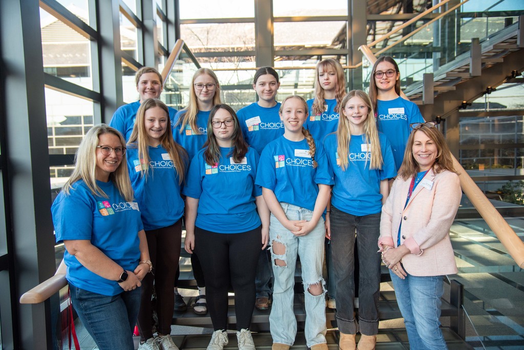 Group photo of students in Blue "Choices" shirt