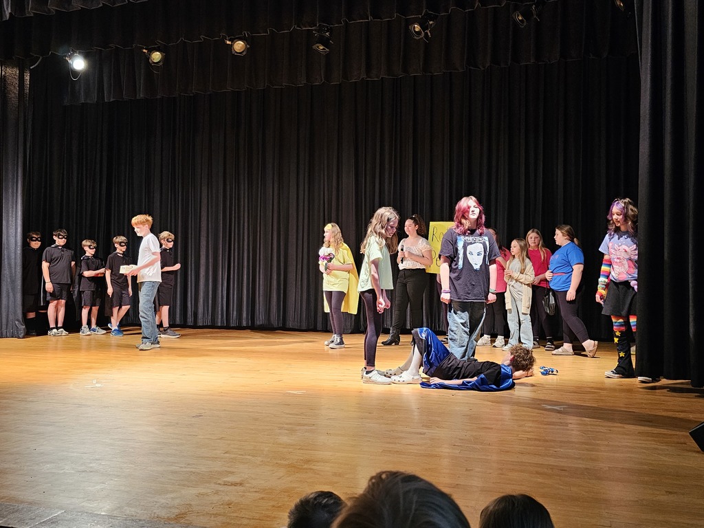 STudents on stage acting