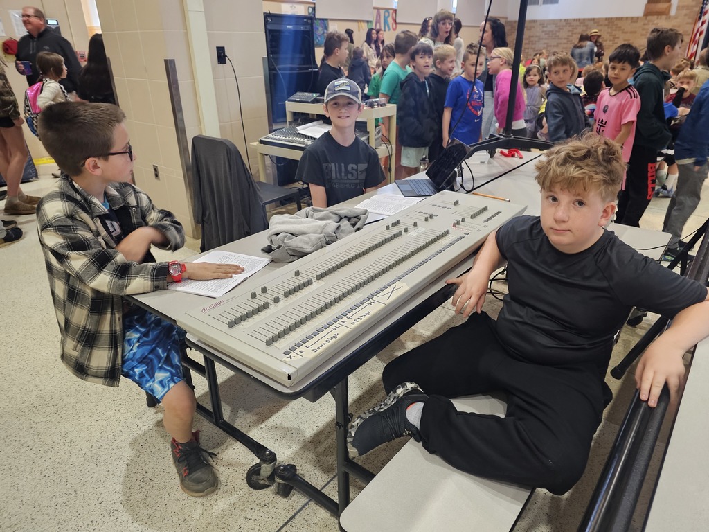 Students runngin sound and lights for play