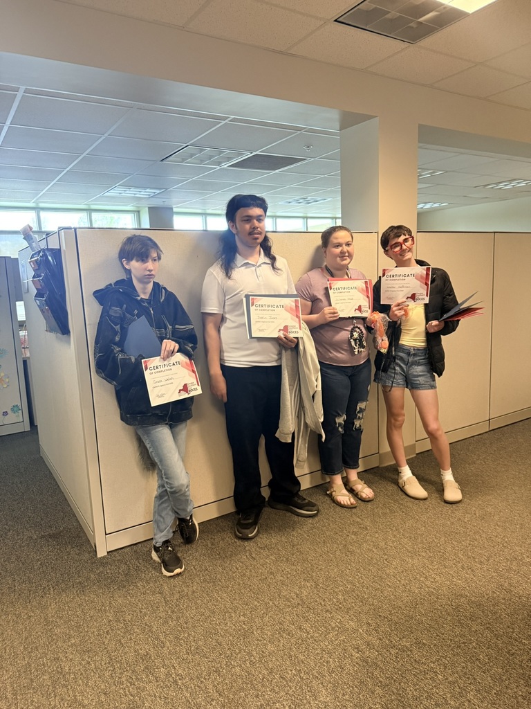 4 students holding certificates for picture