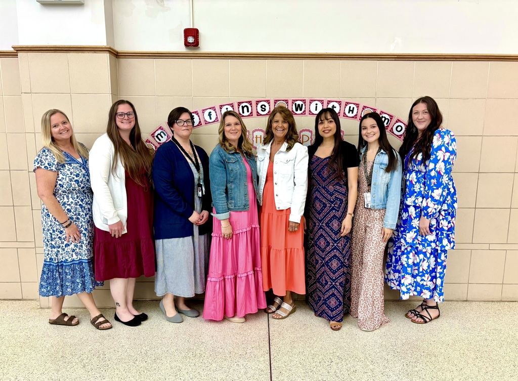 Group photo of PreKTeam in dresses.
