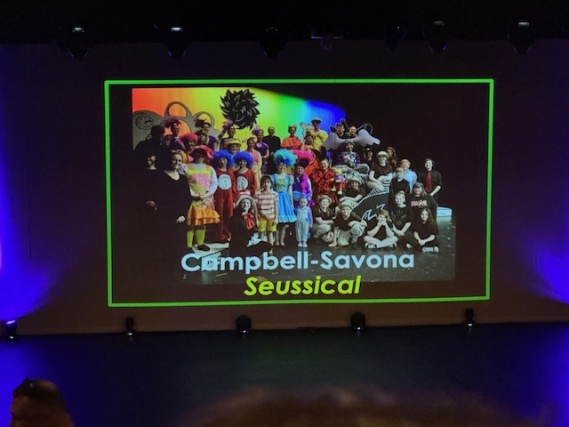 Group photo of CS Seussical cast in costumes