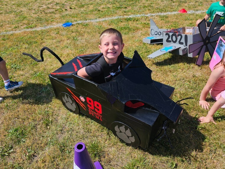 Child in panther racer