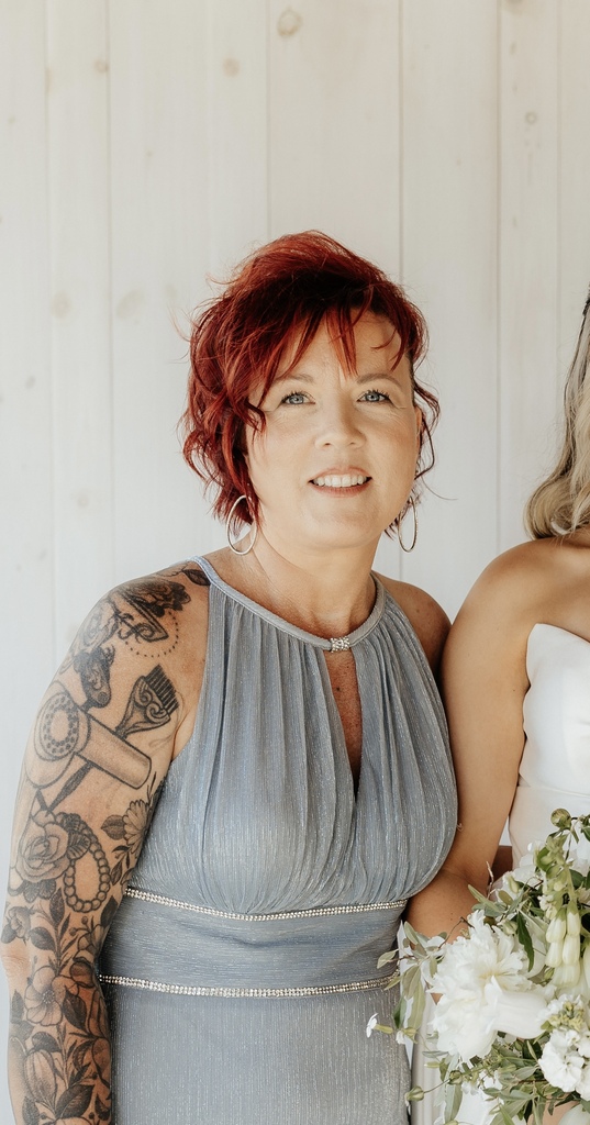 Girl in grey dress with red hair