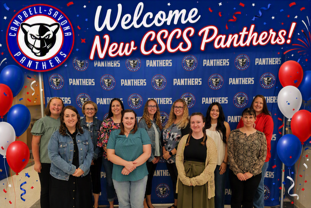 New staff pic in front of panther background