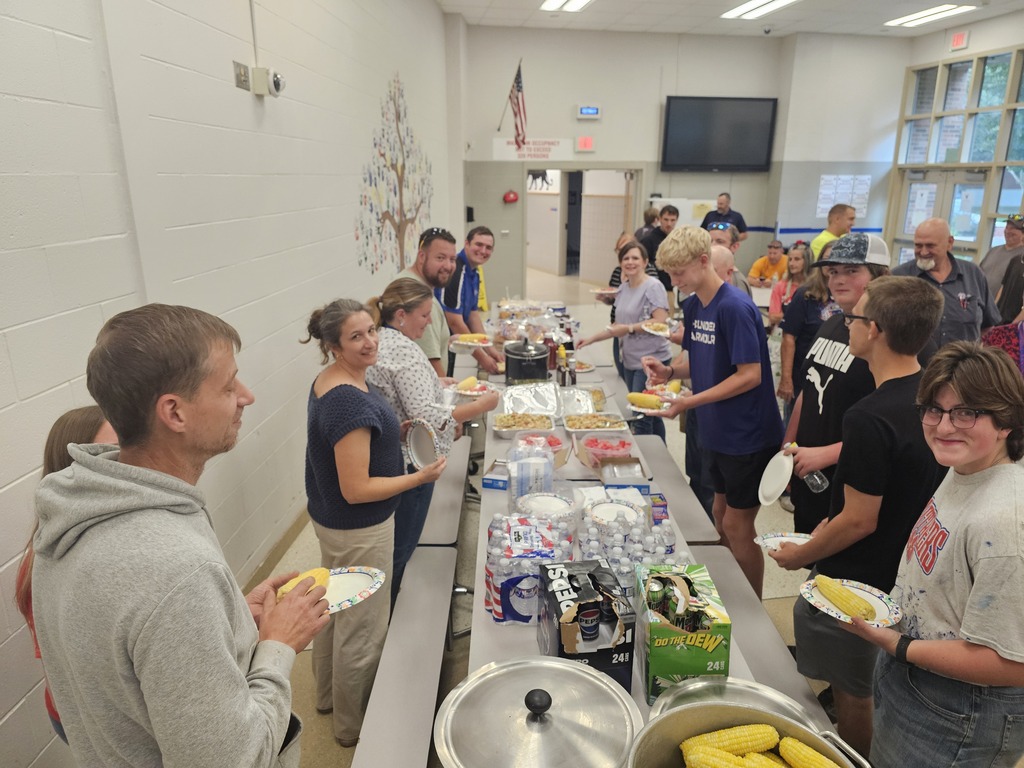 People lined up and getting food