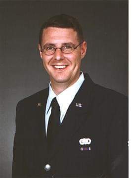Man in military dress posing for picture