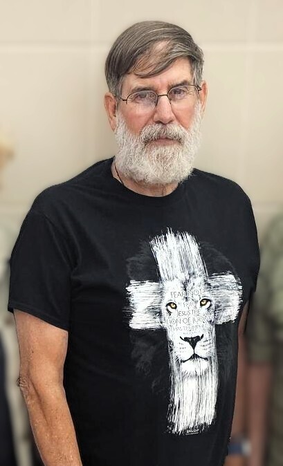 Man with beard and glasses