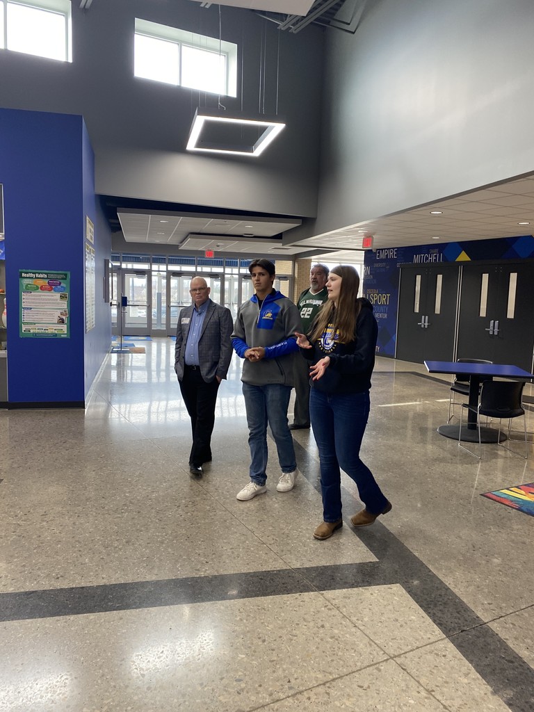 Picture of Senator Dan Feyen, Seniors Hadlee Rohlfs and Eli Fleischman along with Board Member Keith Peters, touring Campbellsport MS/HS