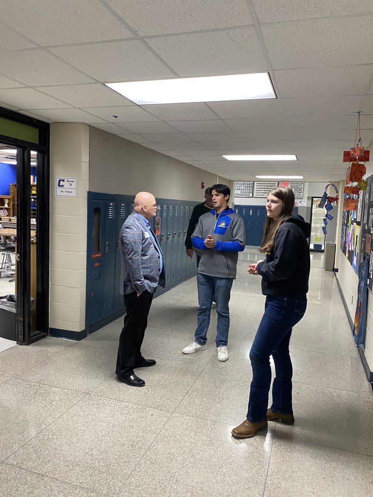 Picture of Senator Dan Feyen, Seniors Hadlee Rohlfs and Eli Fleischman along with Board Member Keith Peters, touring Campbellsport MS/HS