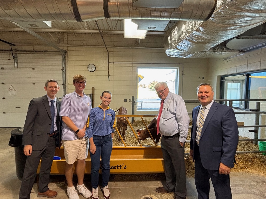 Mr. Wittig, Sawyer, Izzy, Congressman Grothman and Mr. Wissink pose for a photo during the tour. 