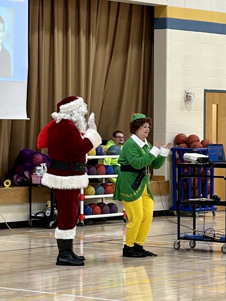 Santa and Buddy the elf at the assembly