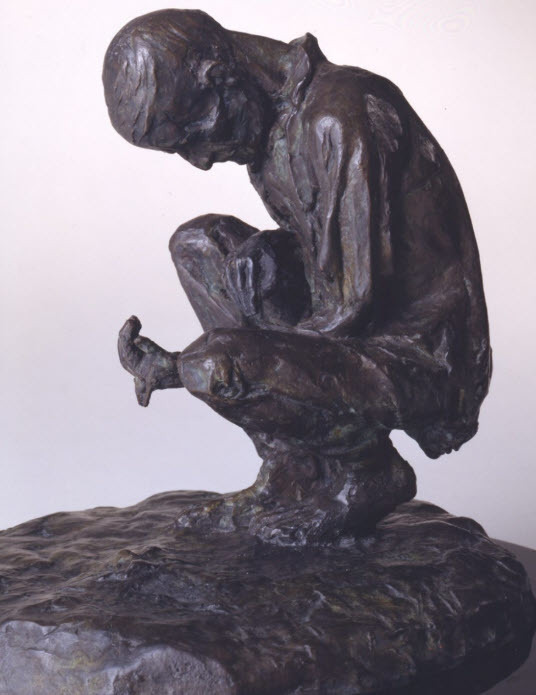 The Great Hunger.  Man sifting through soil looking for potatoes