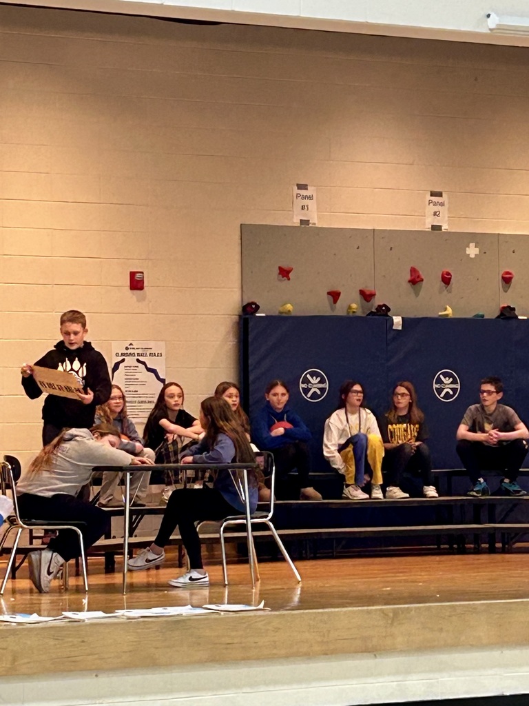 Student council students doing a skit about courage on the stage