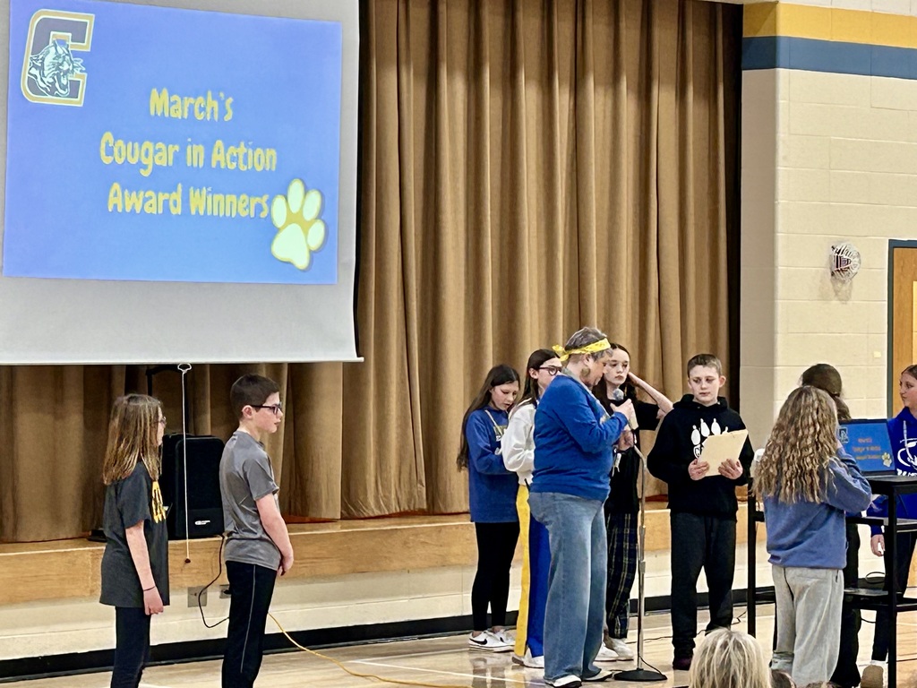 Student council handing out cougar in action awards