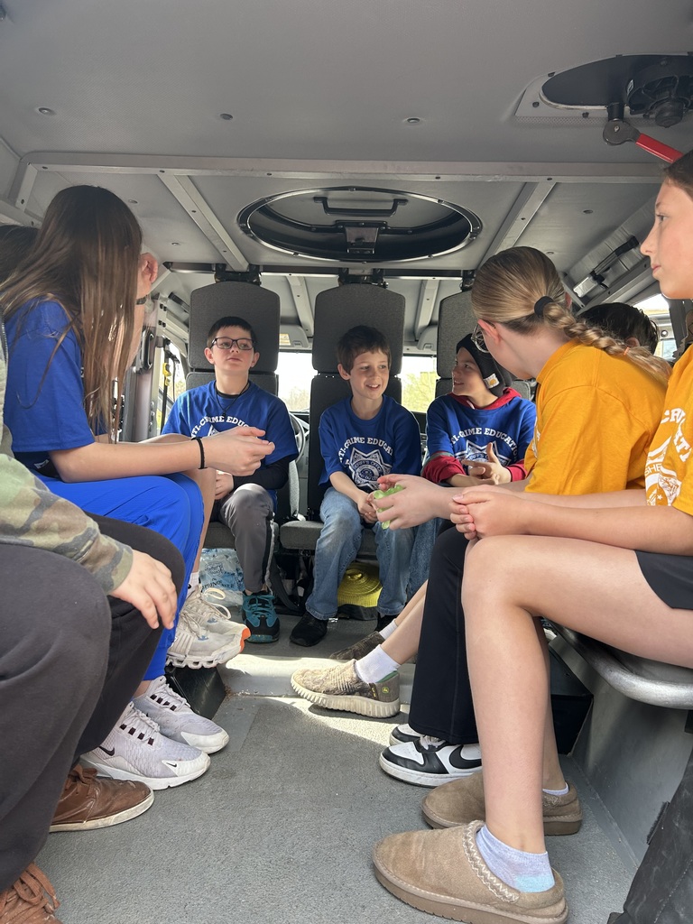 Students inside the armored vehicle