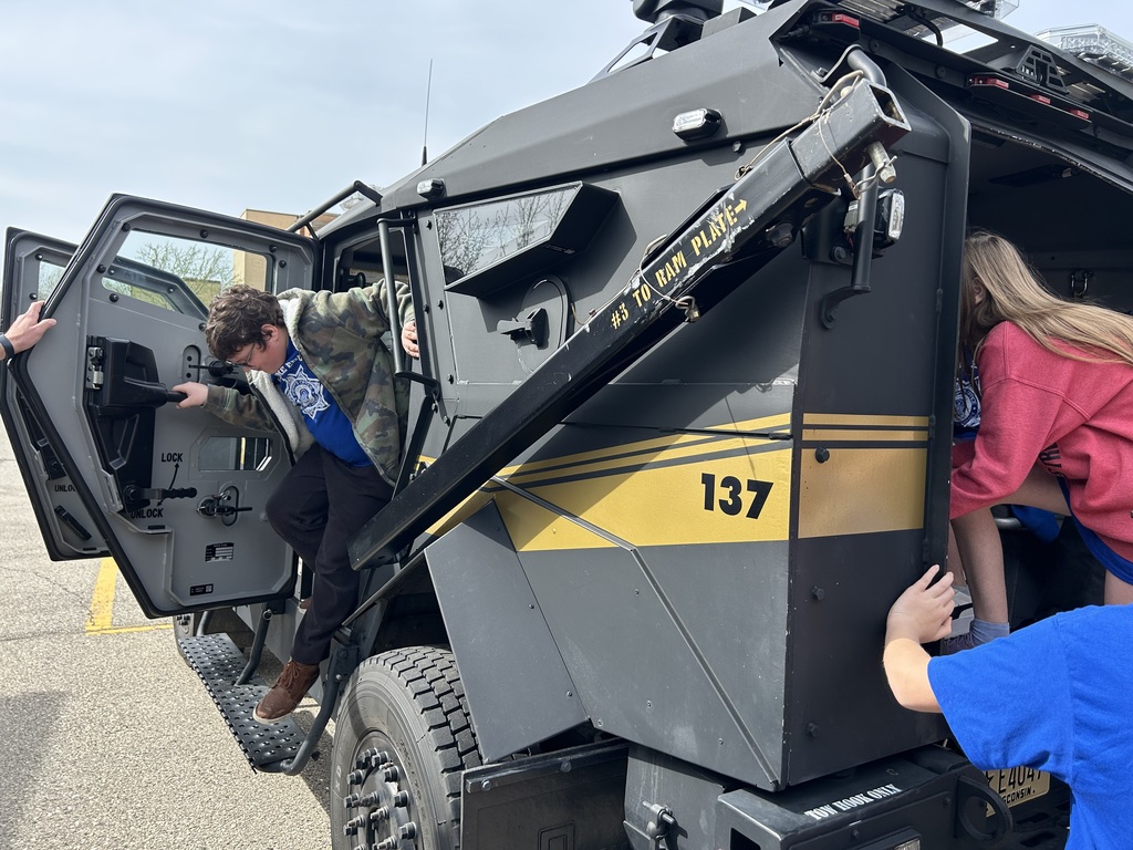 Students inside the armored vehicle