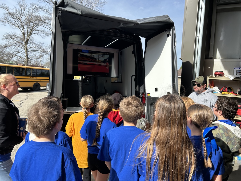 Students observing the police drone
