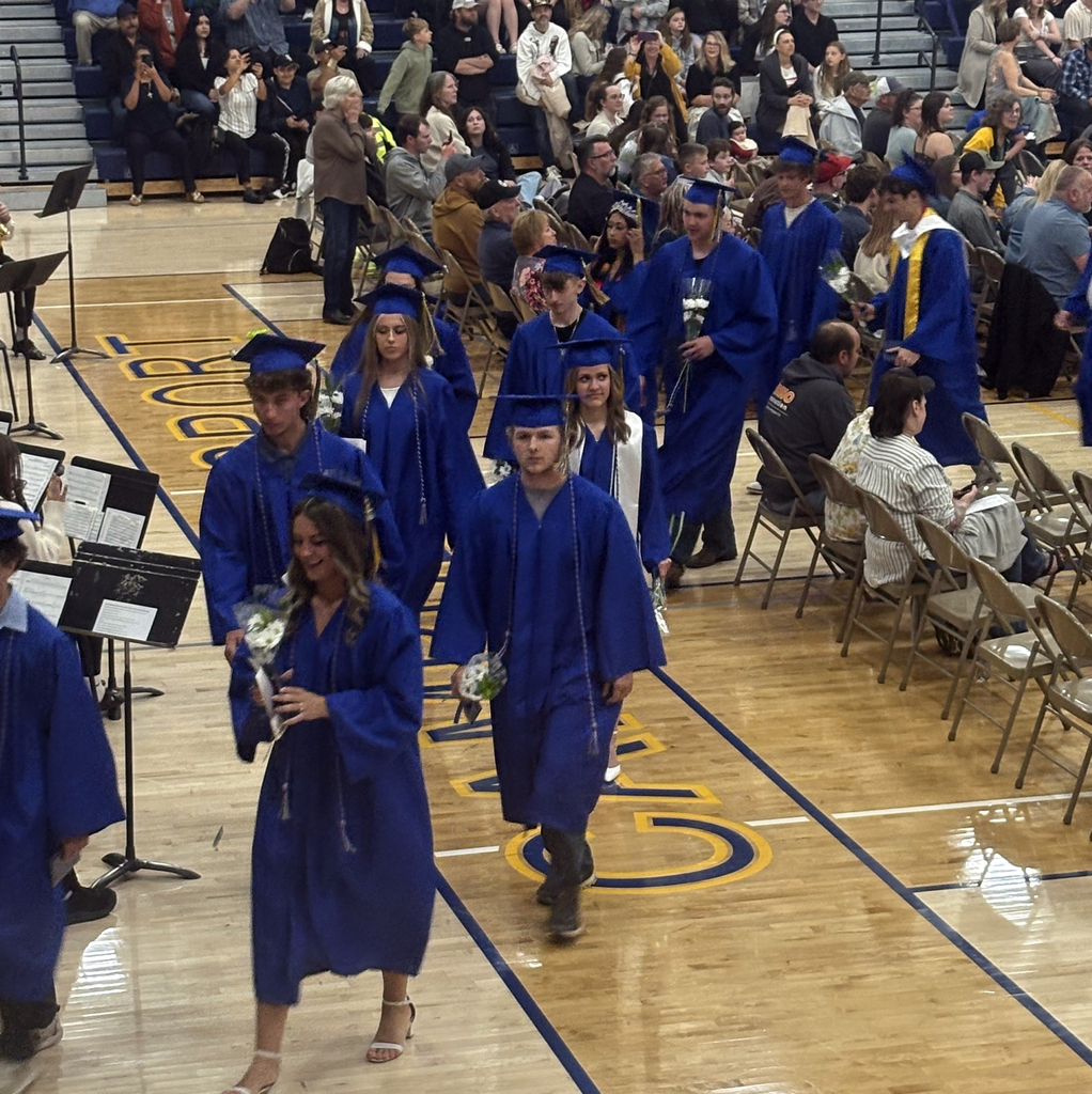 CHS Class of 2026 Graduates marching out after receiving their diplomas.