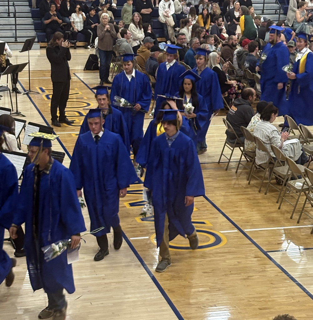 CHS Class of 2026 Graduates marching out after receiving their diplomas.