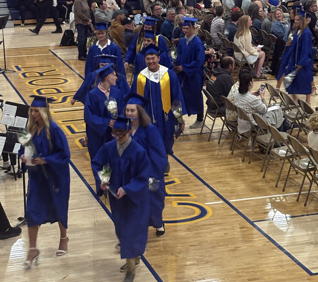 CHS Class of 2026 Graduates marching out after receiving their diplomas.