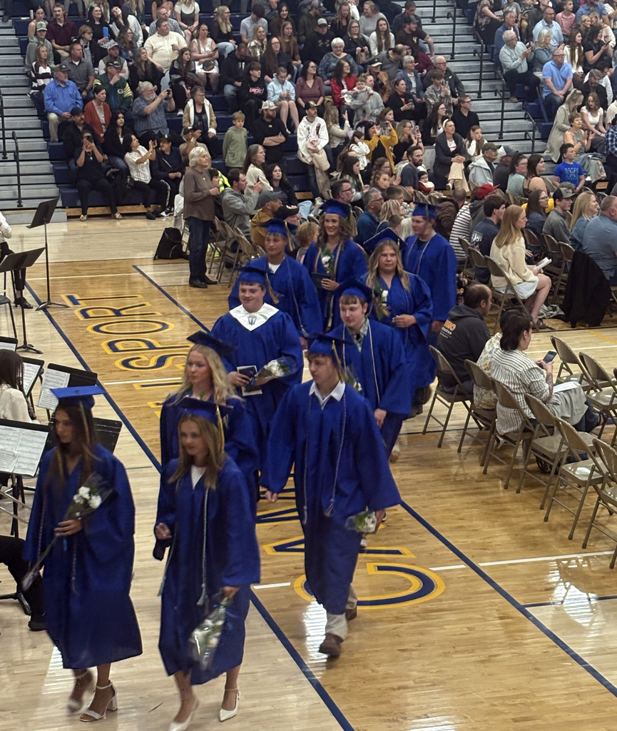 CHS Class of 2026 Graduates marching out after receiving their diplomas.