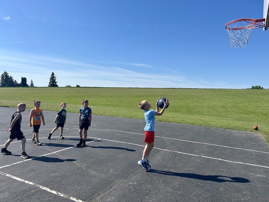 Students playing basketball