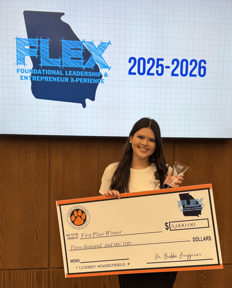 FLEX Final Winner holding check