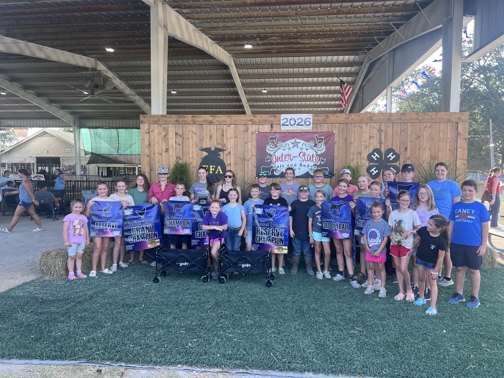 Caney ffa and 4H students stand together for a photo at the Interstate Fair and Rodeo