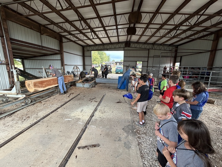 students at the saw mill