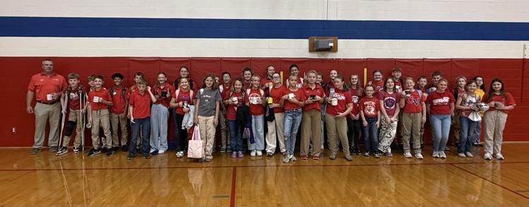 students pose as they dressed up as Mr. Rigdon for Hero Day