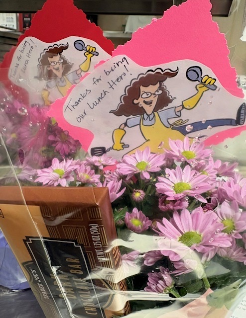 flowers, chocolate, and a thank you note