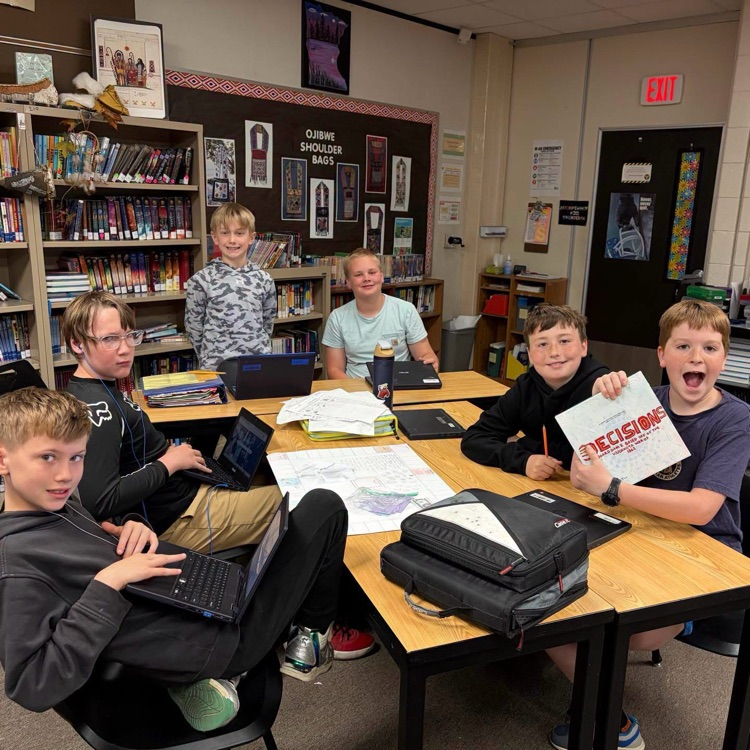 students pictured with board games