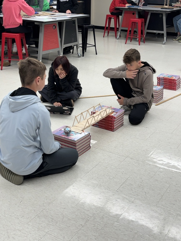 STEM students working on bridges