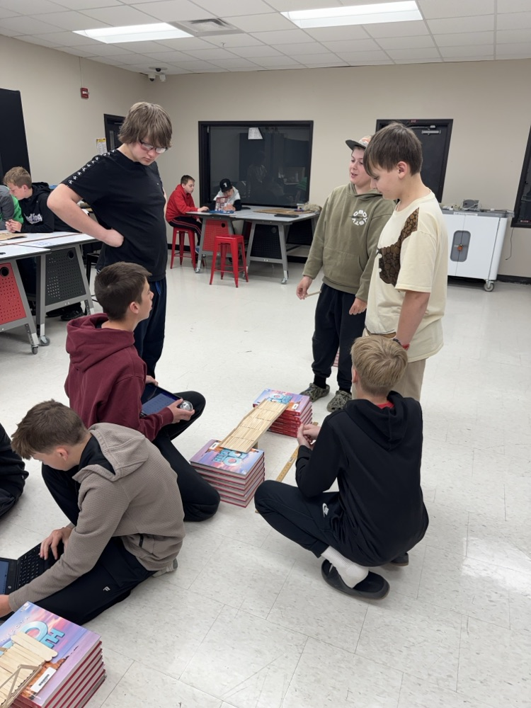 STEM students working on bridges